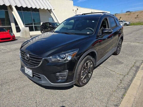 2016 Mazda CX-5 for sale at FREDY CARS FOR LESS in Houston TX