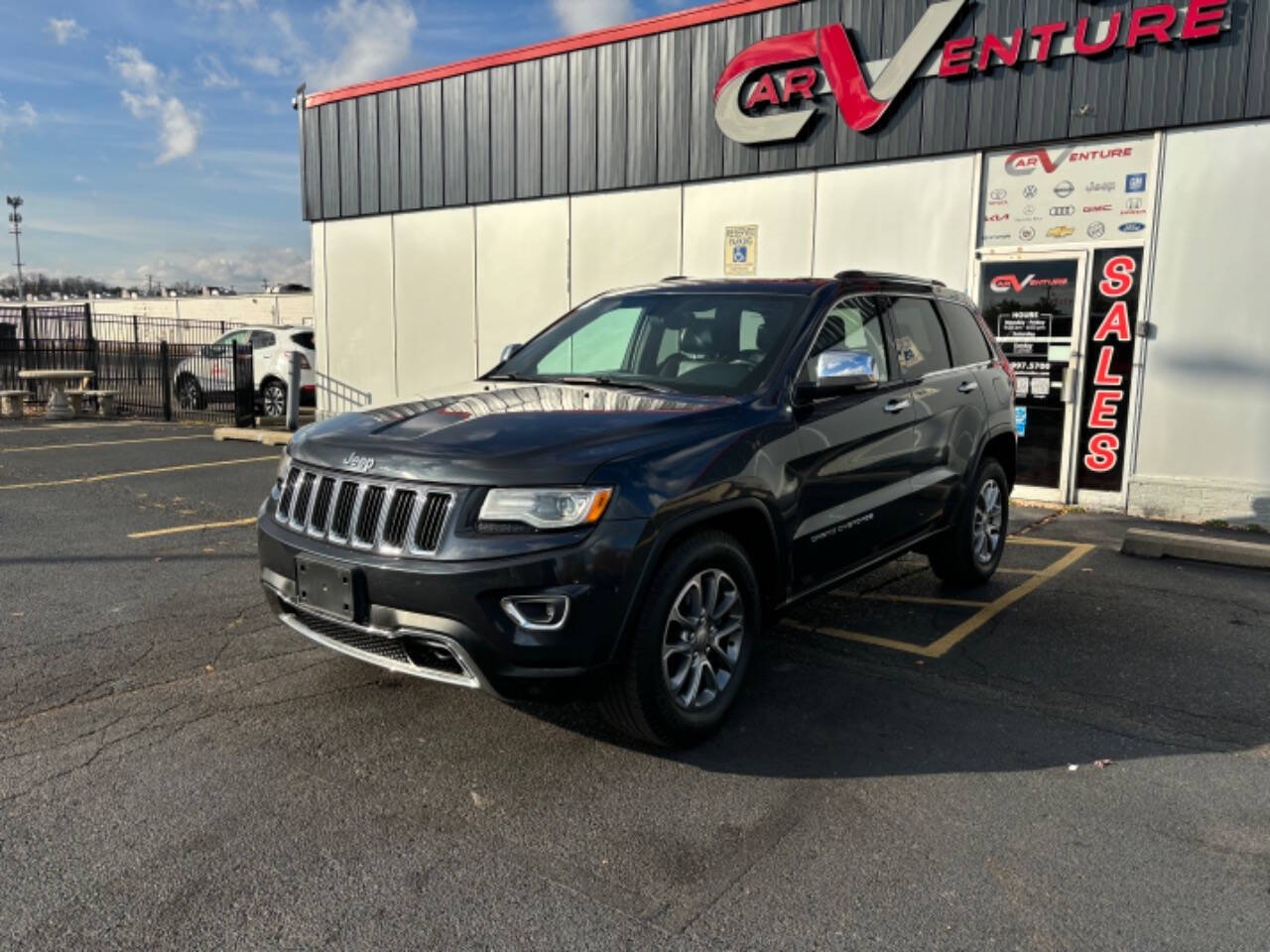 2015 Jeep Grand Cherokee for sale at Carventure in Lansing, MI