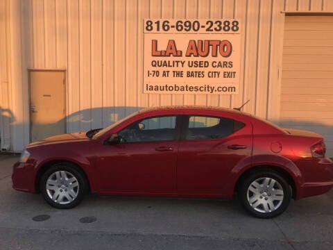 2014 Dodge Avenger for sale at LA AUTO in Bates City MO