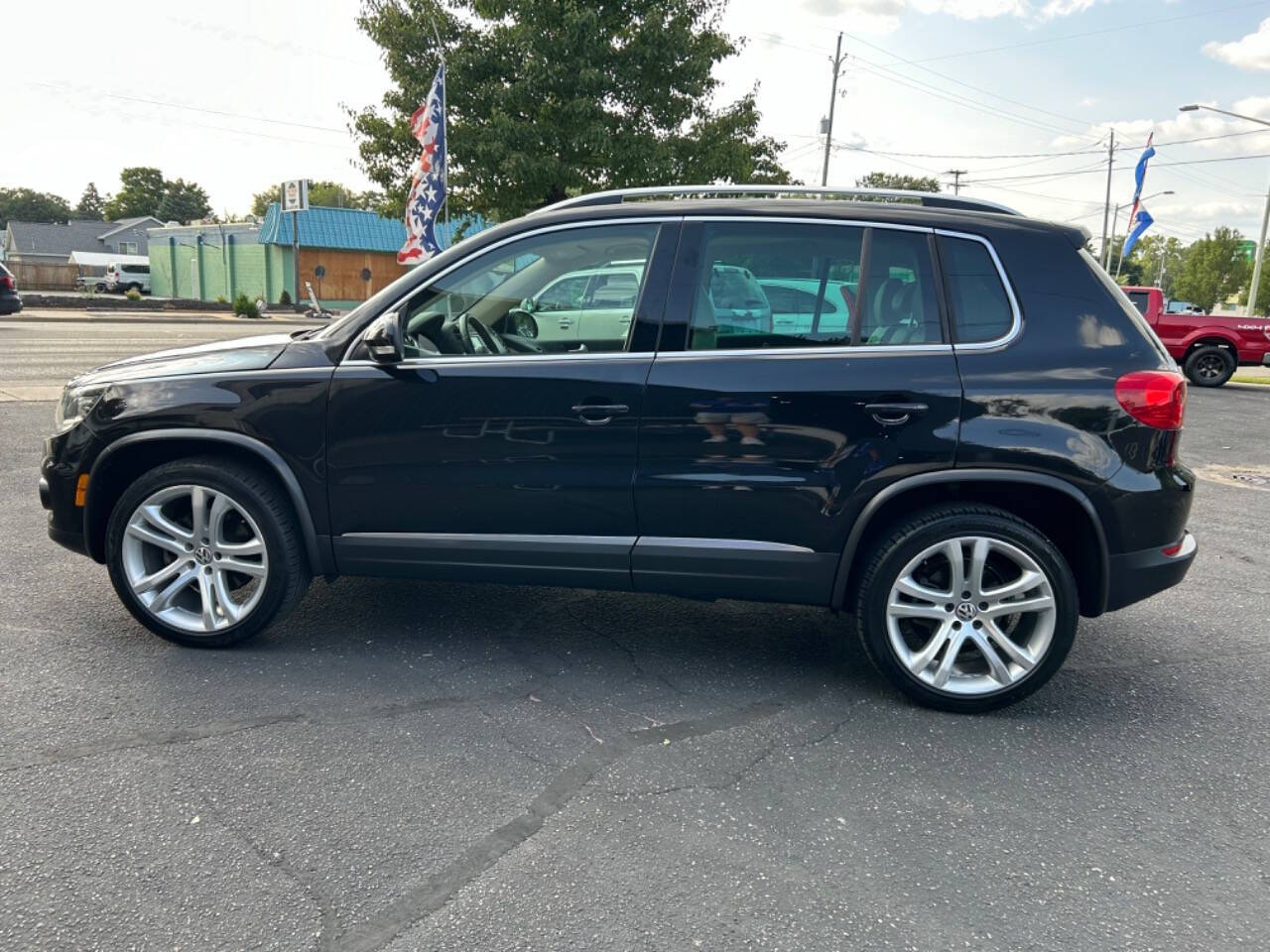 2013 Volkswagen Tiguan for sale at Auto Shop in Wyoming, MI