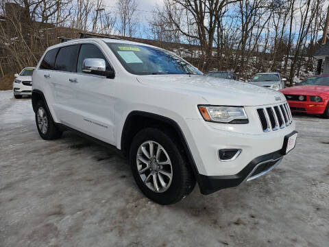 2014 Jeep Grand Cherokee for sale at BARTON AUTOMOTIVE GROUP LLC in Alliance OH