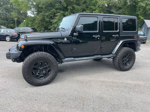 2016 Jeep Wrangler Unlimited for sale at Adairsville Auto Mart in Plainville GA