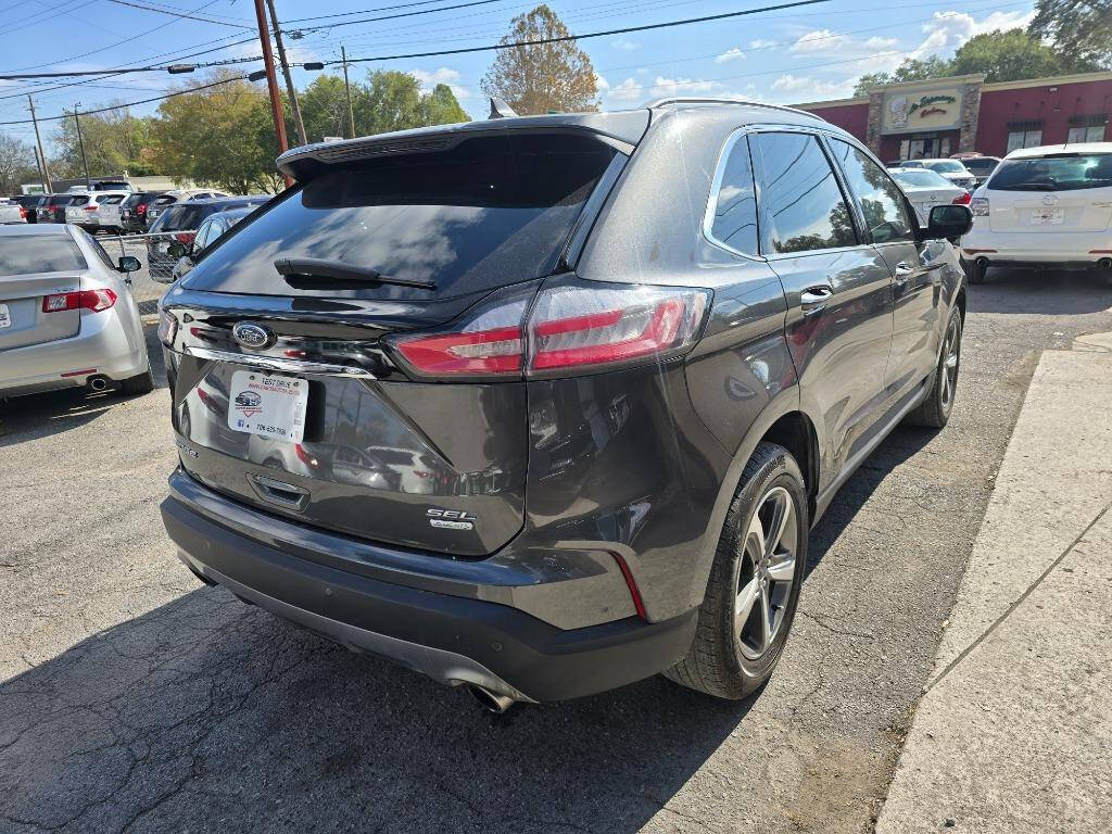 2020 Ford Edge for sale at DAGO'S AUTO SALES LLC in Dalton, GA