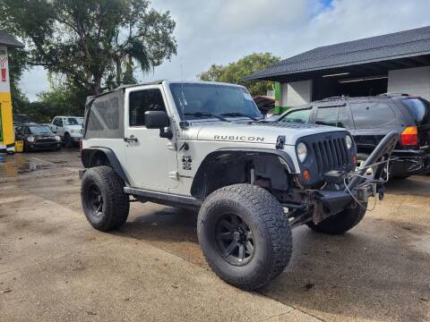 2012 Jeep Wrangler for sale at AUTO TOURING in Orlando FL