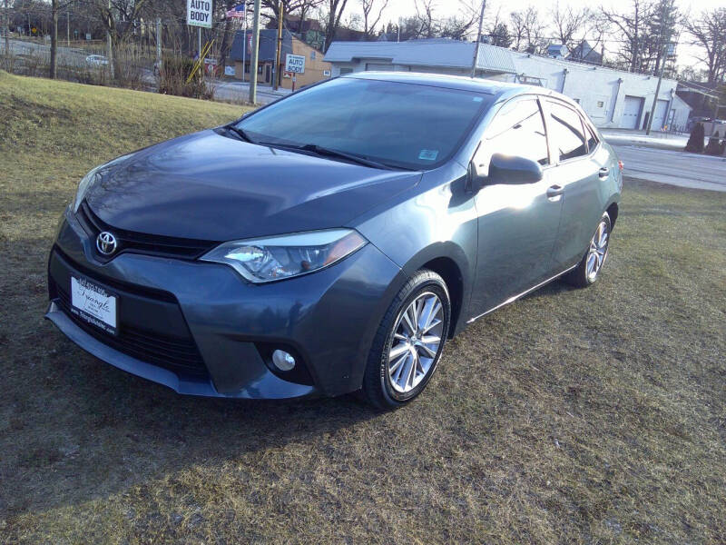 2014 Toyota Corolla for sale at Triangle Auto Sales in Elgin IL