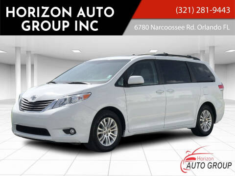 2014 Toyota Sienna for sale at HORIZON AUTO GROUP INC in Orlando FL