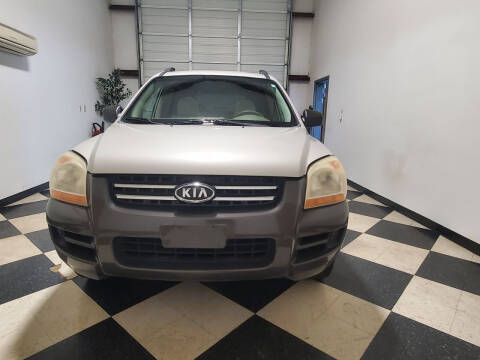 2007 Kia Sportage for sale at ATLANTA MOTORS in Suwanee GA