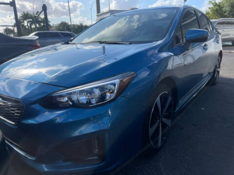 2019 Subaru Impreza for sale at Southstar Auto Group in West Park FL