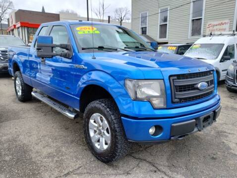 2013 Ford F-150 for sale at Signature Auto Group in Massillon OH