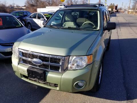 2008 Ford Escape for sale at Howe's Auto Sales in Lowell MA