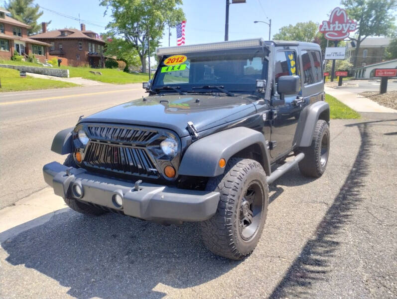 2012 Jeep Wrangler for sale at Signature Auto Group in Massillon OH