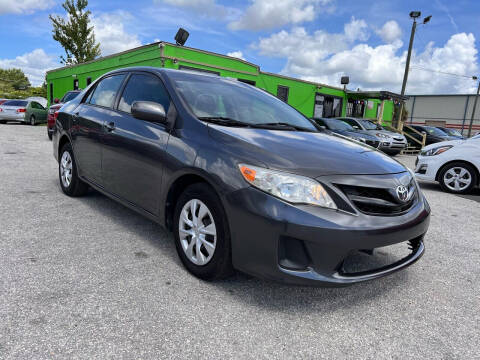2011 Toyota Corolla for sale at Marvin Motors in Kissimmee FL