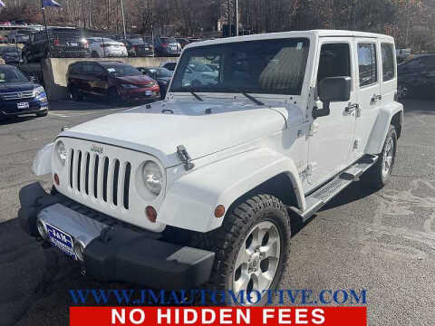 2013 Jeep Wrangler Unlimited for sale at J & M Automotive in Naugatuck CT