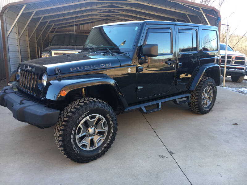 2014 Jeep Wrangler Unlimited for sale at DONS AUTO CENTER in Caldwell OH