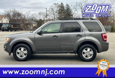 2009 Ford Escape for sale at Zoom Auto Group in Parsippany NJ