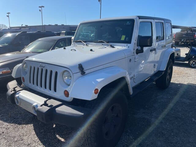 2012 Jeep Wrangler Unlimited for sale at BILLY HOWELL FORD LINCOLN in Cumming GA