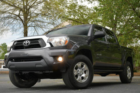 2015 Toyota Tacoma for sale at Carma Auto Group in Duluth GA