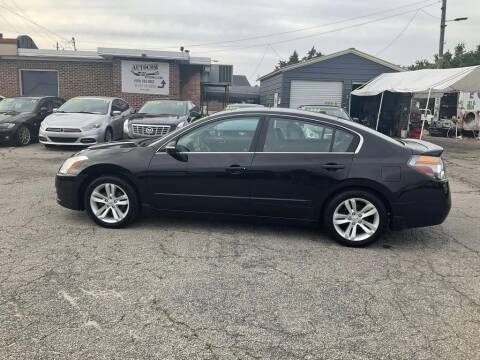 2010 Nissan Altima for sale at Autocom, LLC in Clayton NC