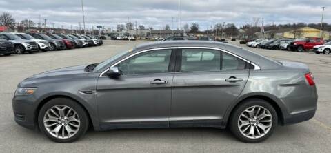 2014 Ford Taurus for sale at VICTORY LANE AUTO in Raymore MO