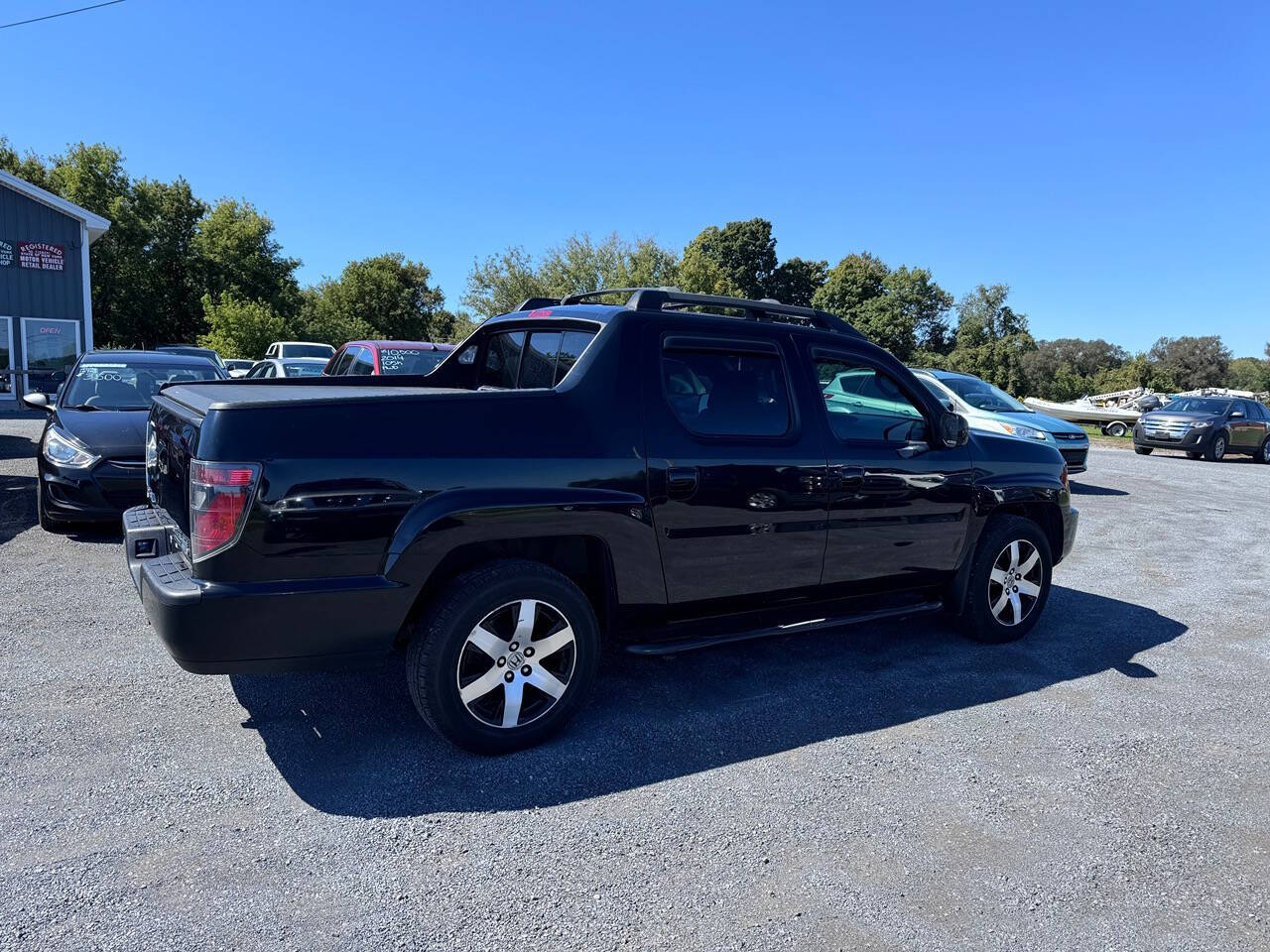 2014 Honda Ridgeline for sale at Riverside Motors in Glenfield, NY