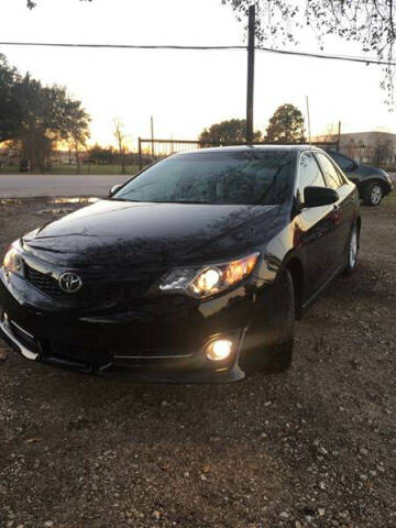 2014 Toyota Camry for sale at COUNTRY MOTORS in Houston TX