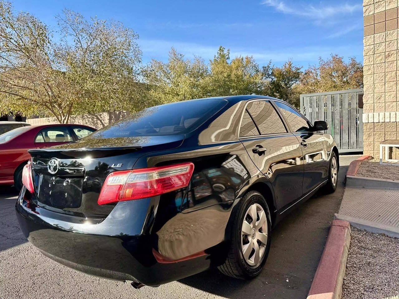 2010 Toyota Camry for sale at HUDSONS AUTOS in Gilbert, AZ