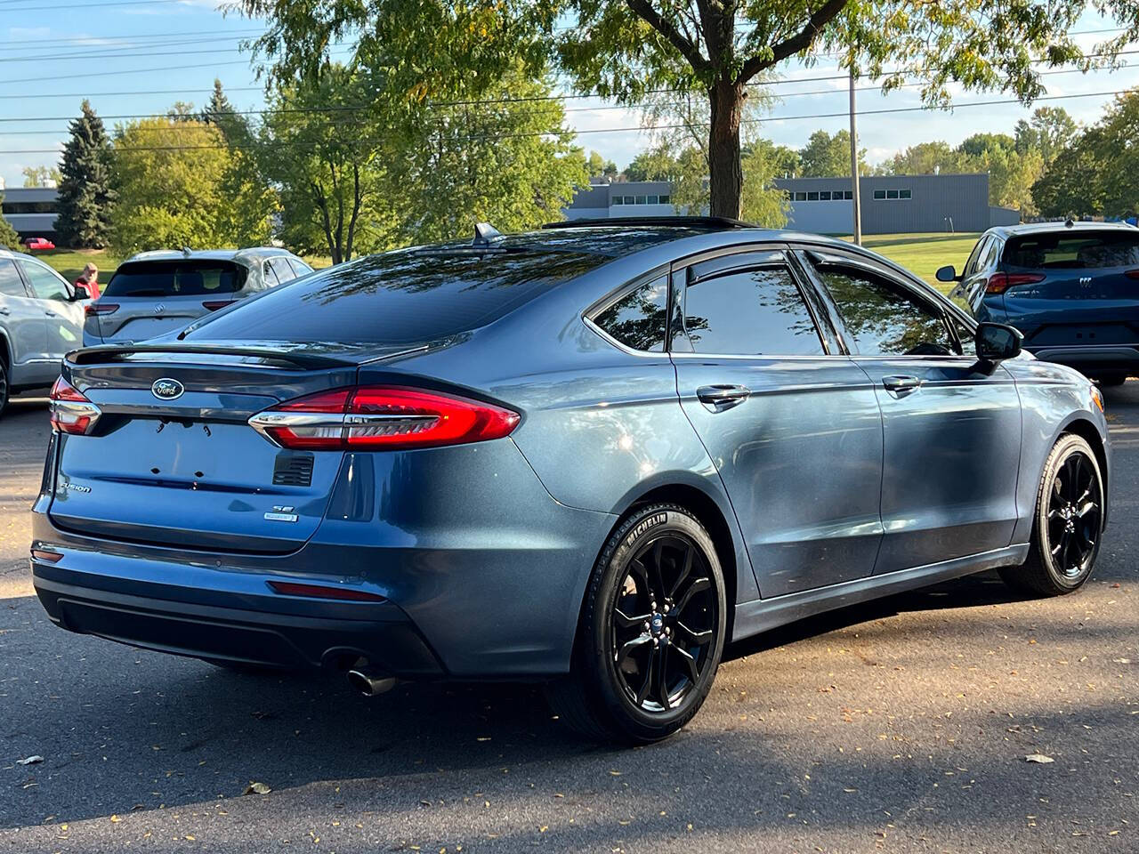 2019 Ford Fusion for sale at Spartan Elite Auto Group LLC in Lansing, MI