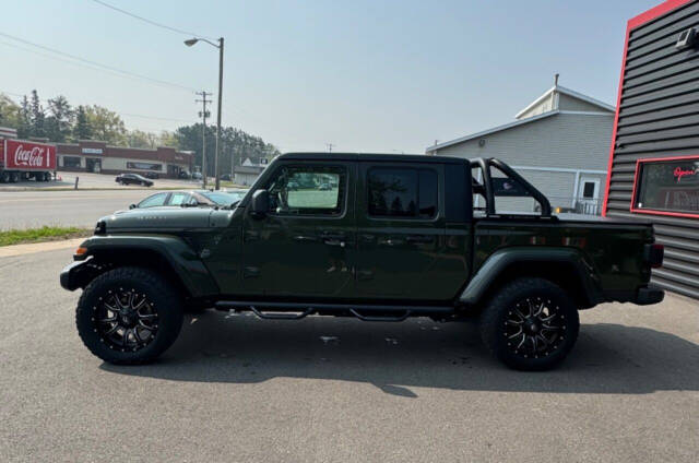 2022 Jeep Gladiator for sale at SIGNATURE AUTOS LLC in Weston, WI