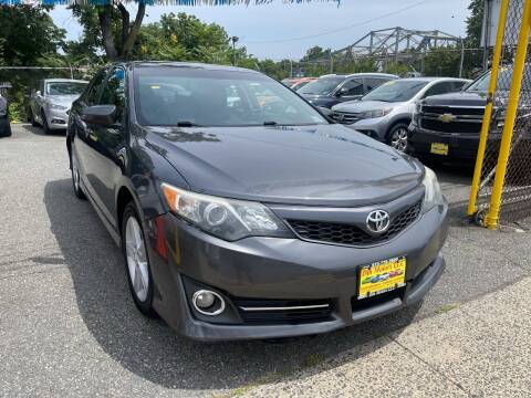 2012 Toyota Camry for sale at Din Motors in Passaic NJ