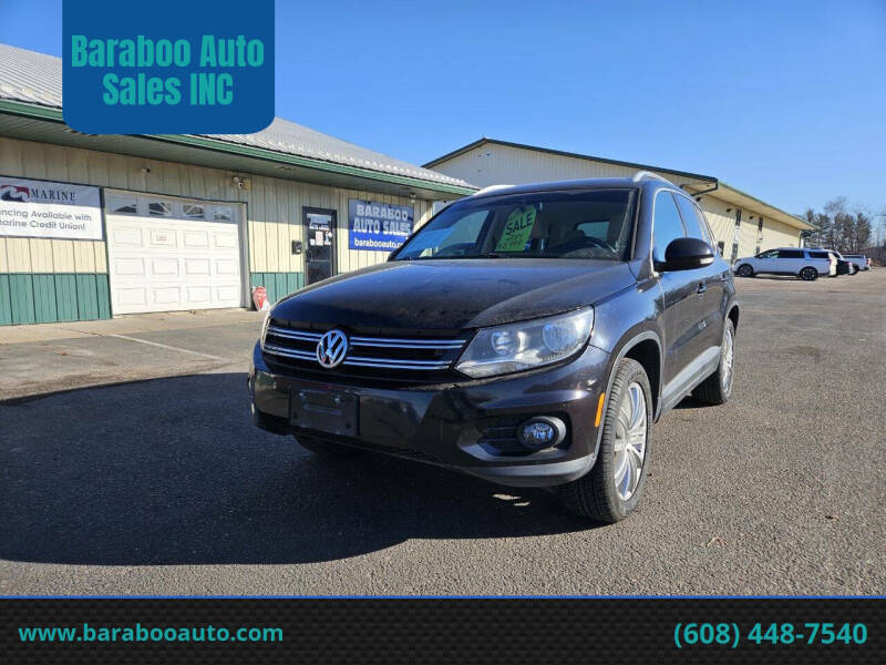 2014 Volkswagen Tiguan for sale at Baraboo Auto Sales INC in Baraboo WI