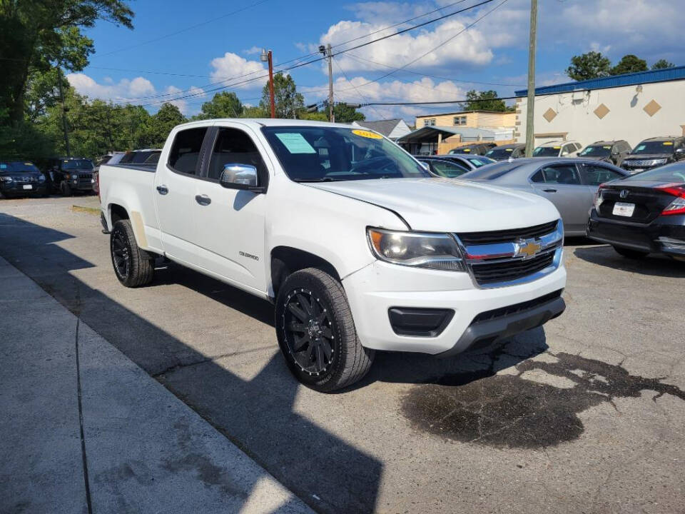 2015 Chevrolet Colorado for sale at DAGO'S AUTO SALES LLC in Dalton, GA