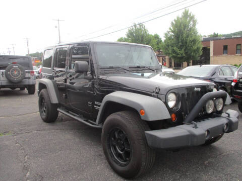 2011 Jeep Wrangler Unlimited for sale at Car Depot Auto Sales in Binghamton NY