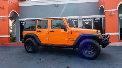 2012 Jeep Wrangler Unlimited for sale at Car Depot in Homestead FL