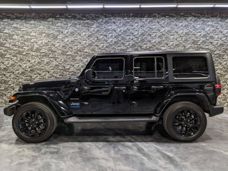 Used 2022 Jeep Wrangler Unlimited Sahara 4XE with VIN 1C4JJXP65NW124984 for sale in Detroit, MI