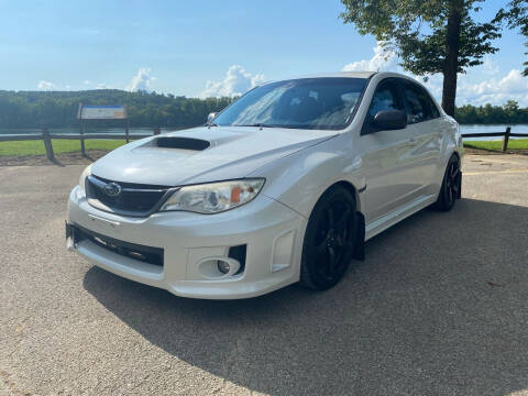 2014 Subaru Impreza for sale at Monroe Auto's, LLC in Parsons TN