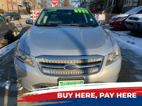 2010 Ford Taurus for sale at Barnes Auto Group in Chicago IL
