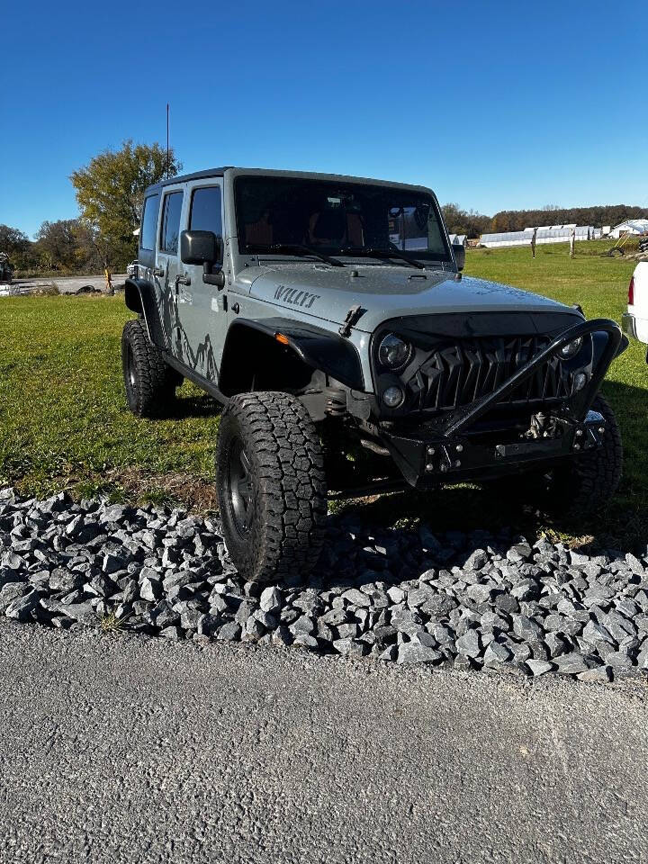 2015 Jeep Wrangler Unlimited for sale at Riverside Motors in Glenfield, NY