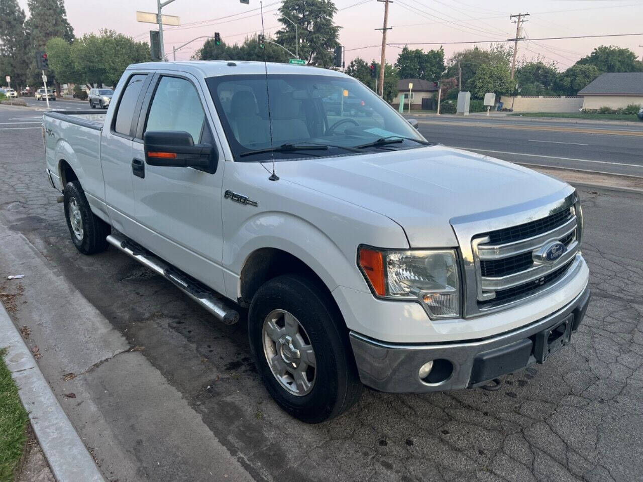 2013 Ford F-150 for sale at AUTO 4 LESS in Fresno, CA