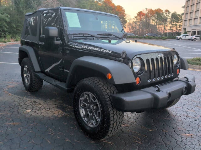 2013 Jeep Wrangler for sale at Capital Motors in Raleigh, NC