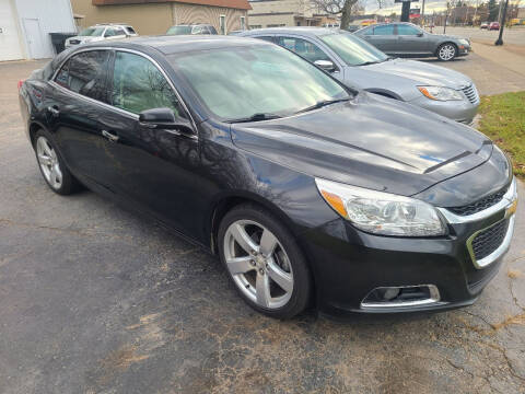 2014 Chevrolet Malibu for sale at Van Kalker Motors in Grand Rapids MI