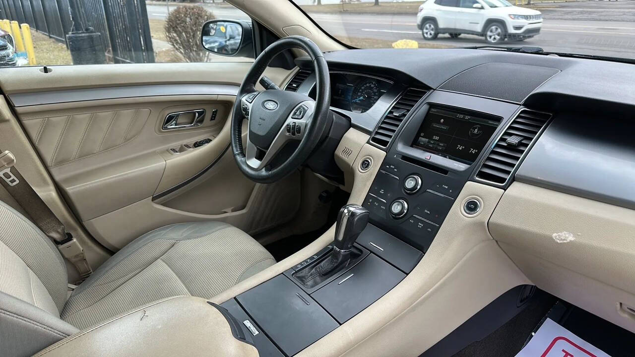 Black 2015 Ford Taurus SEL SEL 4dr Sedan 16