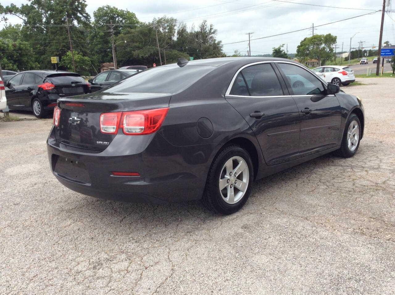 2013 Chevrolet Malibu for sale at SPRINGTIME MOTORS in Huntsville, TX