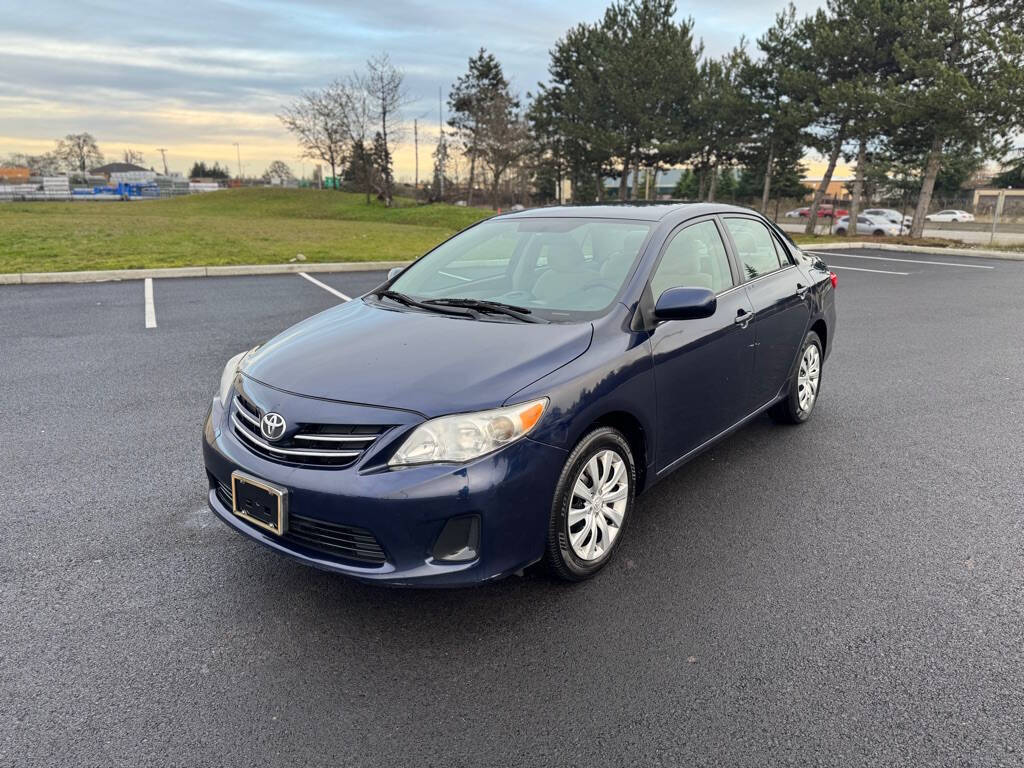 2013 Toyota Corolla for sale at The Price King Auto in LAKEWOOD, WA