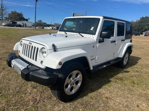 2014 Jeep Wrangler Unlimited for sale at Select Auto Group in Mobile AL