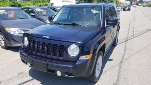 2011 Jeep Patriot for sale at Howe's Auto Sales in Lowell MA