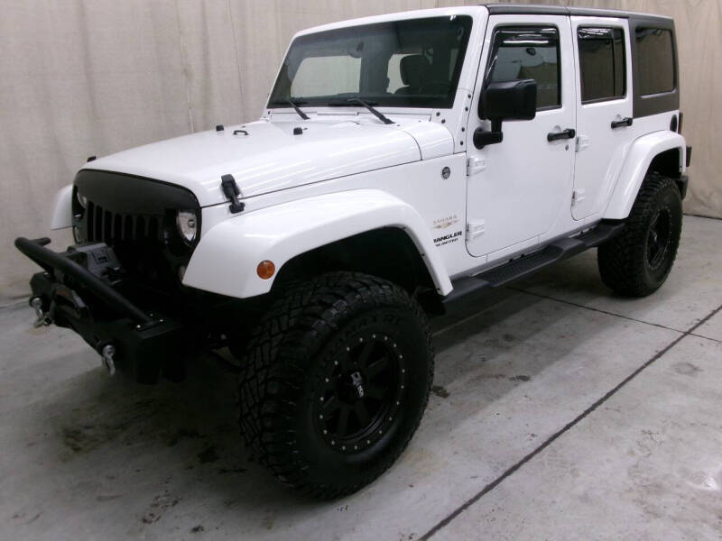 2015 Jeep Wrangler Unlimited for sale at Paquet Auto Sales in Madison OH