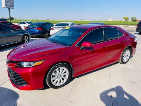 2020 Toyota Camry for sale at A AND A AUTO SALES in Gadsden AZ