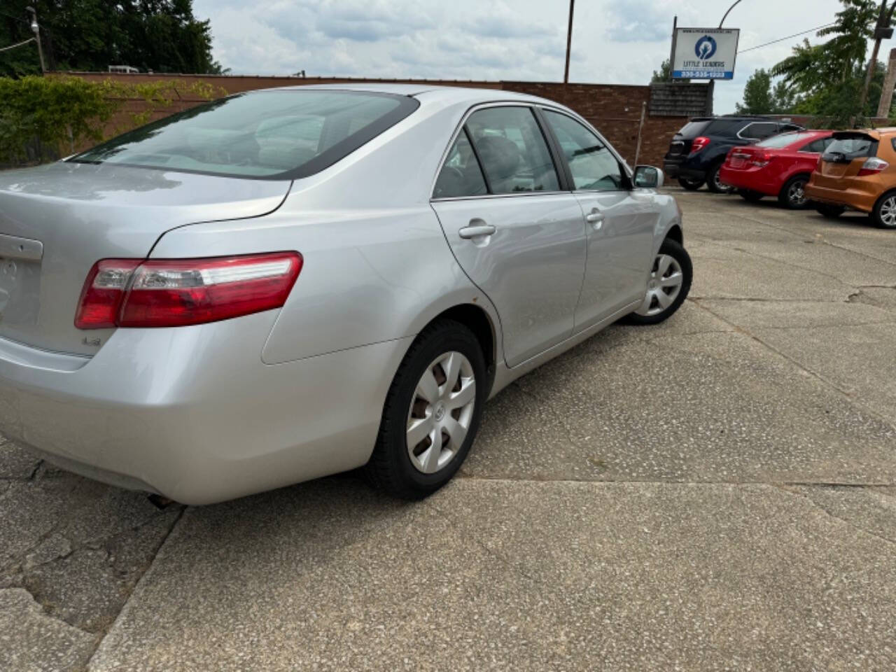 2009 Toyota Camry for sale at First Class Auto Mall in Akron, OH