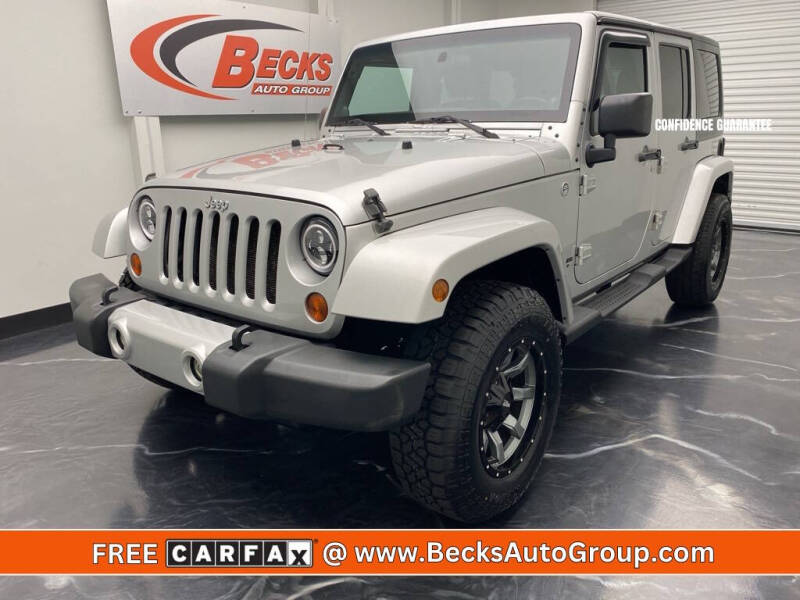 2011 Jeep Wrangler Unlimited for sale at Becks Auto Group in Mason OH