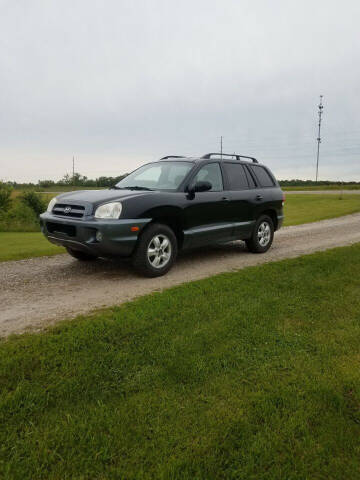 2005 Hyundai Santa Fe for sale at WESTSIDE GARAGE LLC in Keokuk IA